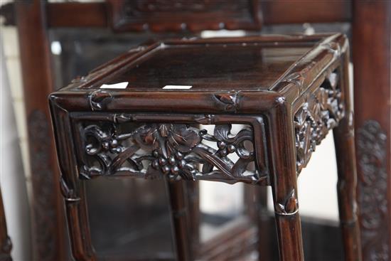 A tall Chinese rosewood stand, early 20th century, width 35cm square, height 115.5cm